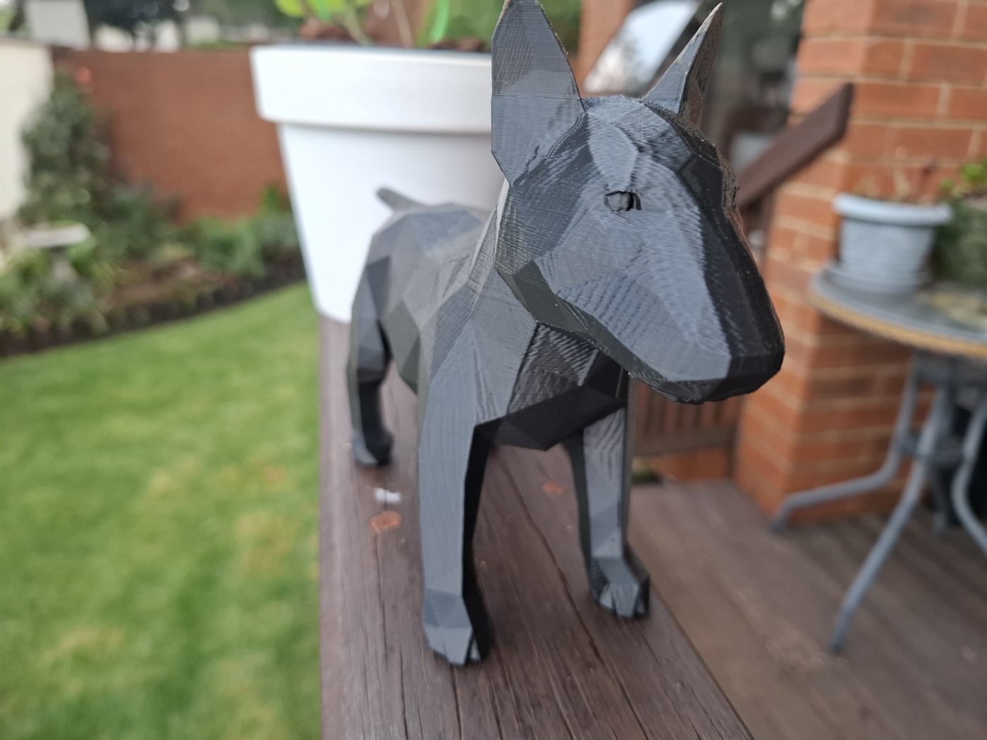 Low-poly bull terrier sculpture